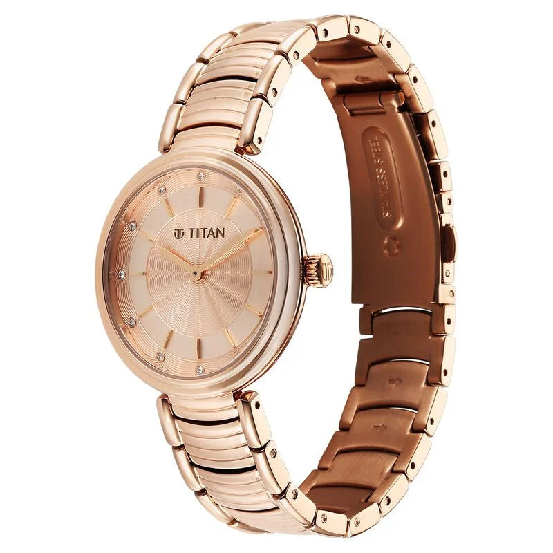 Titan Aura Quartz Analog Rose Gold Dial Rose Gold Stainless Steel Strap Watch for Women 95240WM01